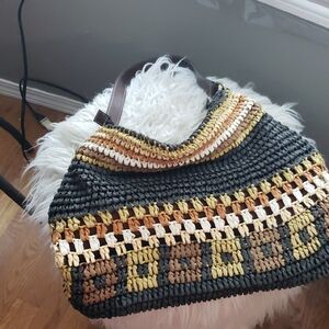 Elegant Woven Hobo Bag in Black and Brown